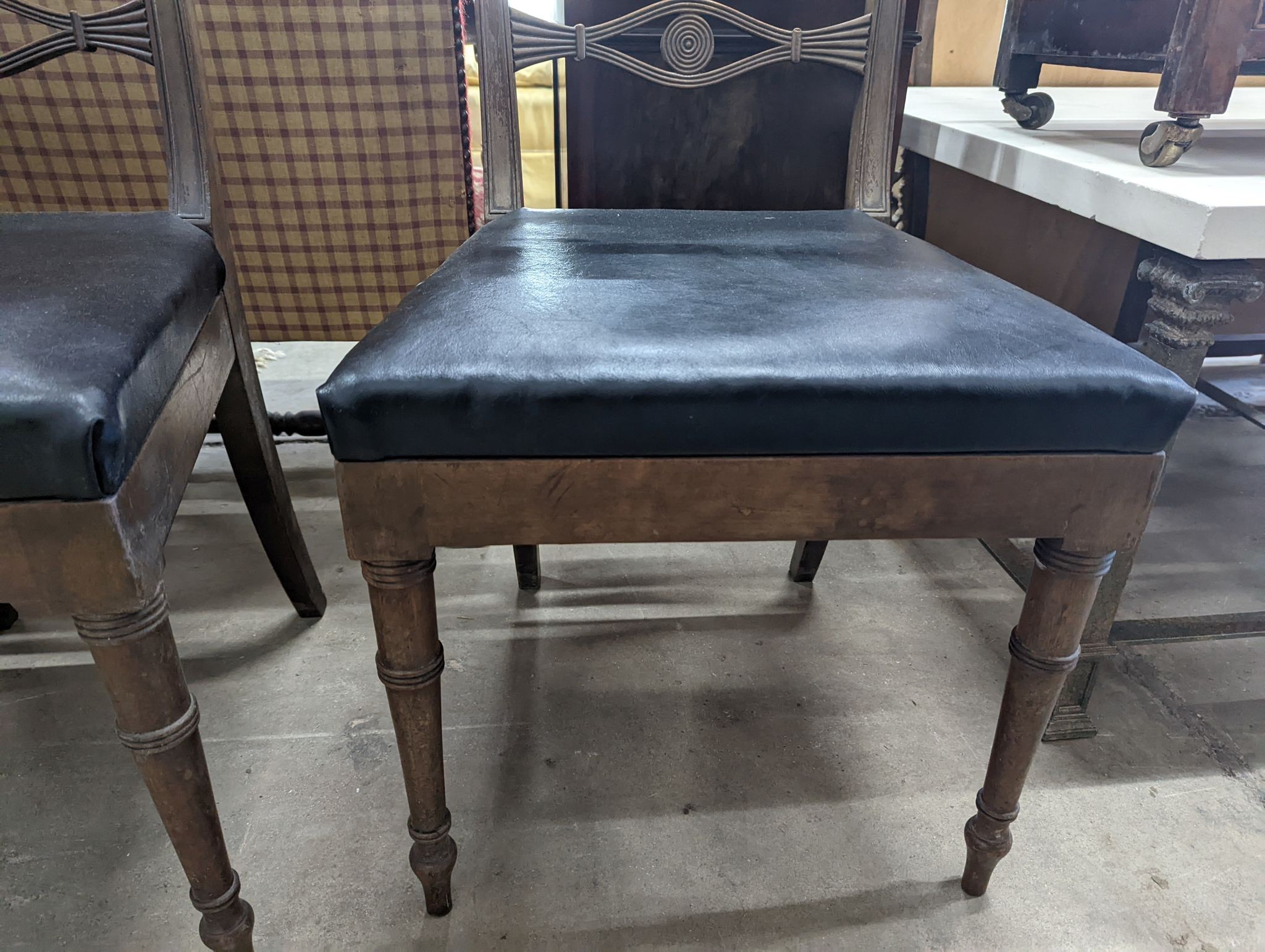 A pair of Regency mahogany dining chairs